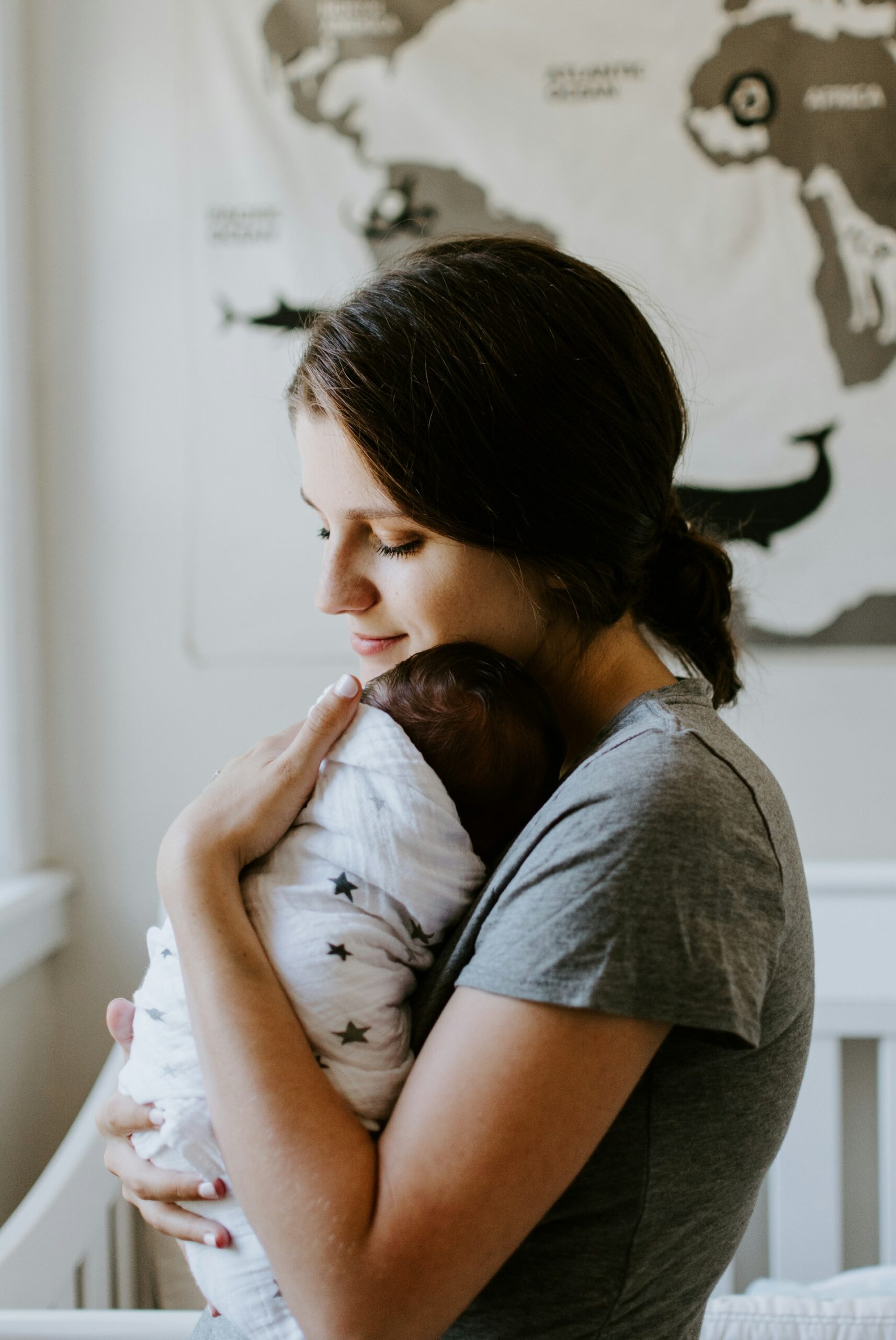 A mom holding her baby